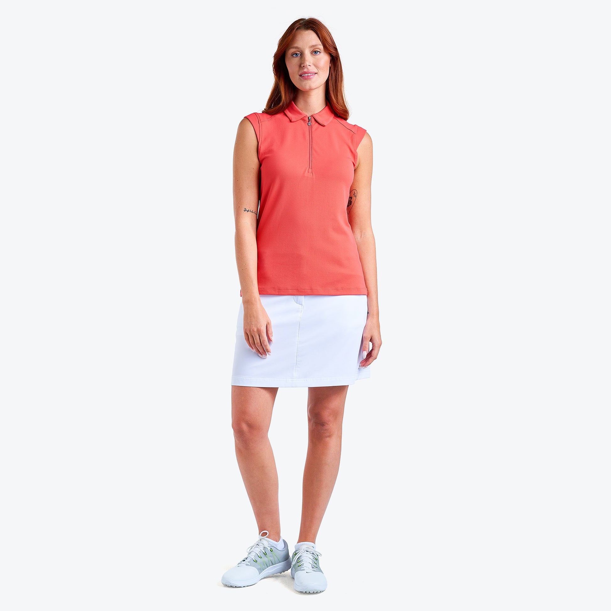 Nivo Nikki II Sleeveless Pique Polo Shirt in Papaya Full Product Image