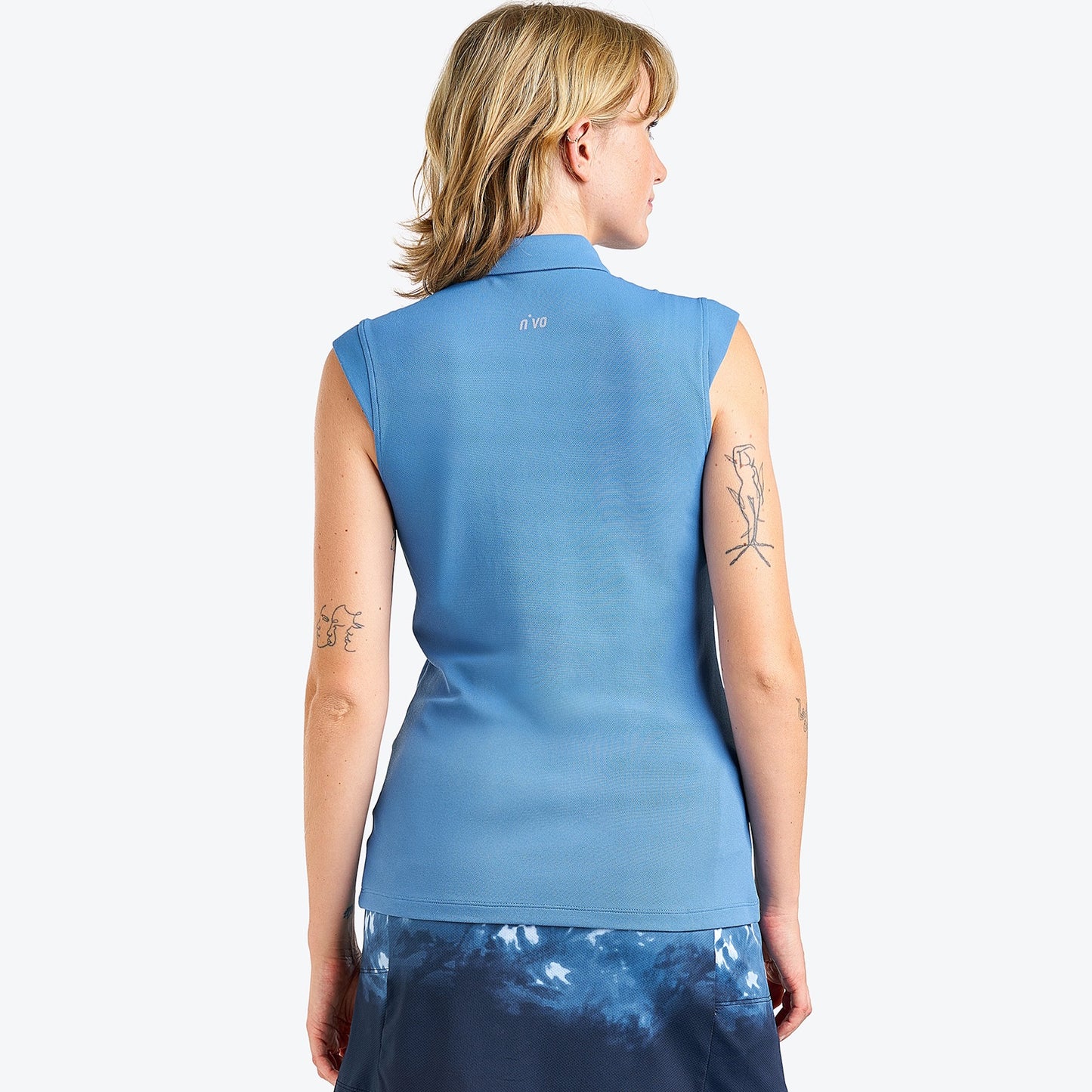 nivo-nikki-ii-sleeveless-pique-polo-shirt-sea-reflection-rear-facing-product-image