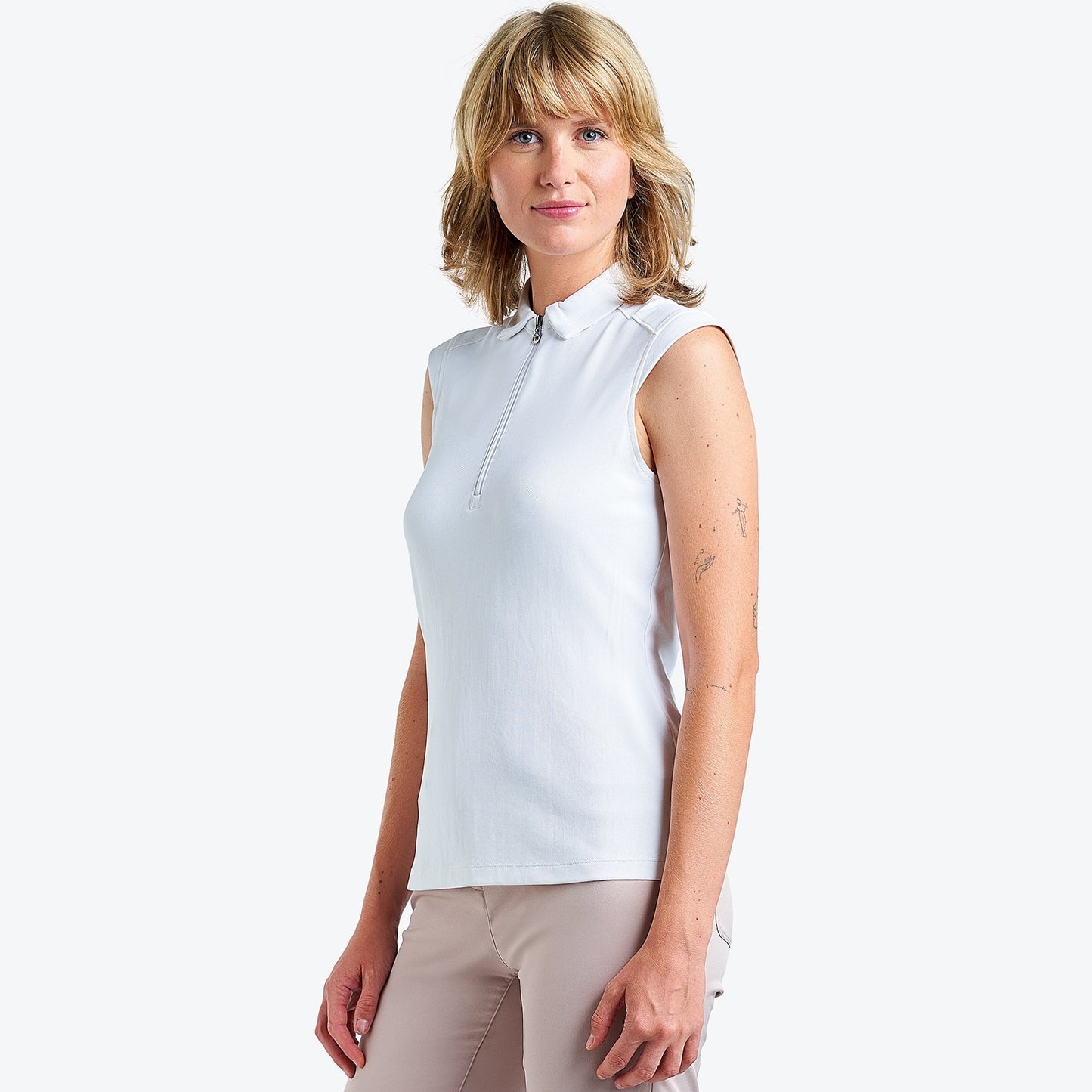 Nivo Nikki II Sleeveless Pique Polo Shirt in White Side Facing Product Image